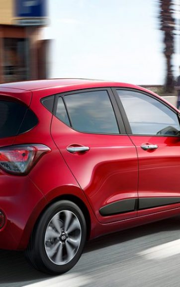 i10-gallery-side-rear-view-red-driving-road-original Hyundai i10